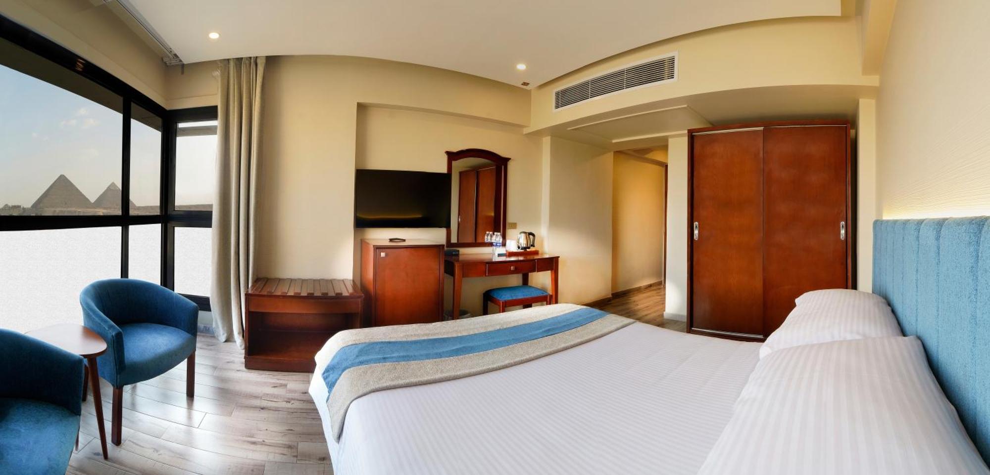Stay Inn Pyramids Hotel Al Kawm al Akhdar Exteriör bild