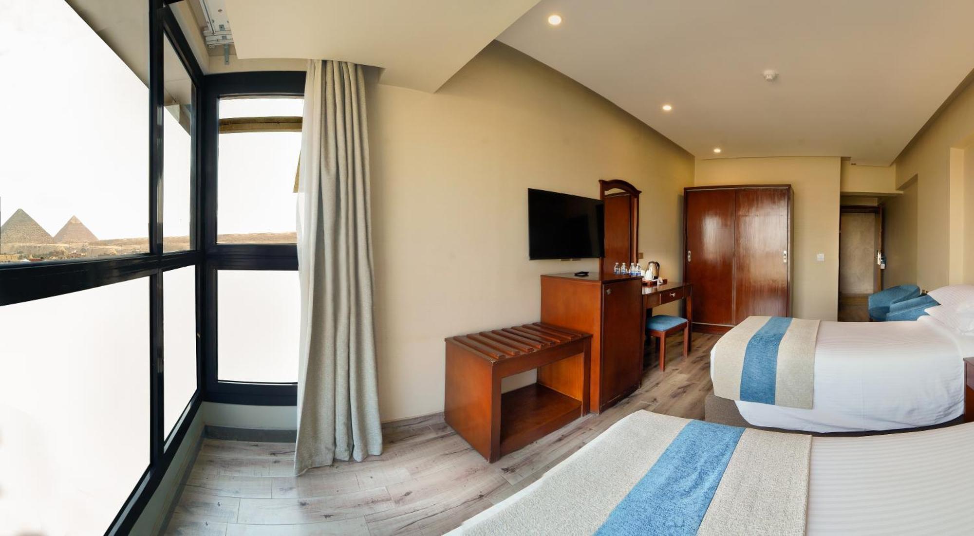 Stay Inn Pyramids Hotel Al Kawm al Akhdar Exteriör bild